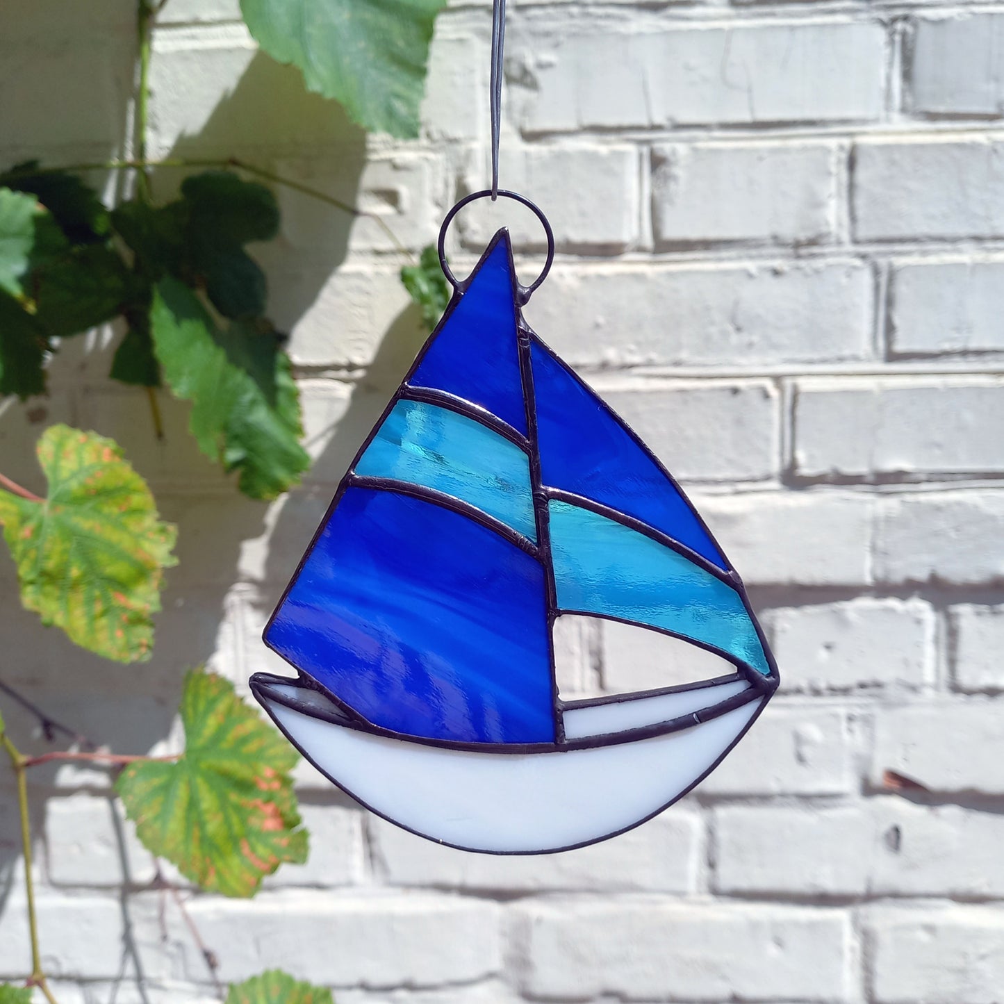 Stained Glass Sailboat Suncatcher with Blue Sails