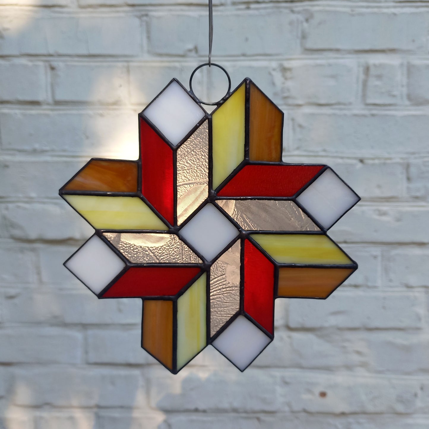 Geometric Quilt Star Stained Glass Suncatcher 3D Optical Illusion in Fall Colors